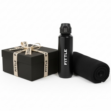 Black Fittle water bottle and towel with a gift box on a white background